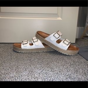 White Sandals with  a Slight he Platform